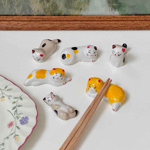 Cat spoons and chopsticks.